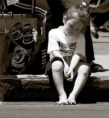  taken @ the Santa Parade. Girl is bored and hot from waiting.